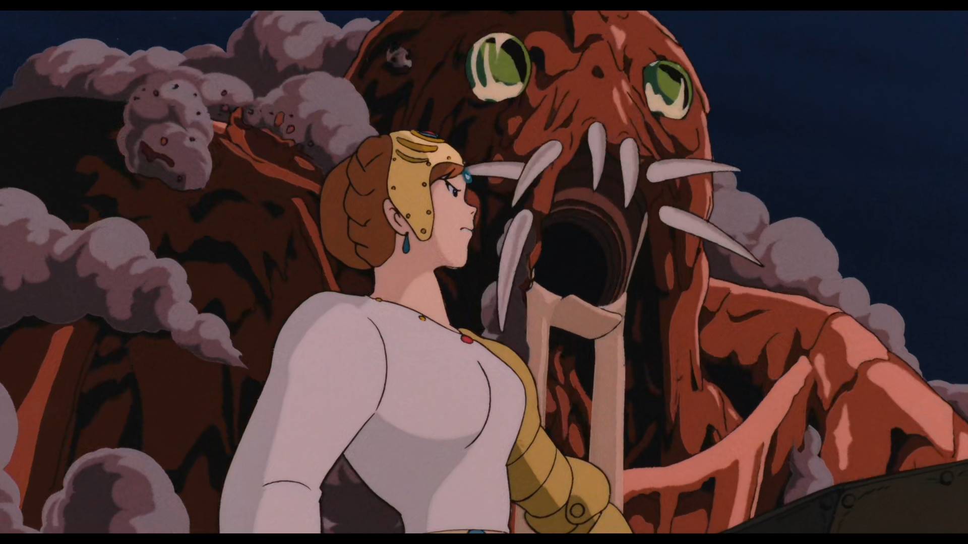 Scène de Nausicaä de la Vallée du Vent
Au premier plan, Princesse Kushana, jeune femme aux cheveux châtains, aux yeux noirs, portant une tunique blanche, un genre d'armure recouvrant tout son bras gauche, une couronne étrange sur la tête et des boucles d'oreille, se tient de profil et arbore un air déterminé.
Derrière elle, se tient un Guerrier Géant, immense créature vaguement humanoïde, à la peau argileuse, aux yeux verts vitreux avec une bouche dont semble s'échapper du sable entourée d'immenses dents pointues disposées de manière chaotique. De la poussière semble s'échapper de plusieurs endroits de son corps, comme pour souligner son aspect instable.
Le ciel en arrière plan est noir, indiquant que la scène se déroule la nuit.