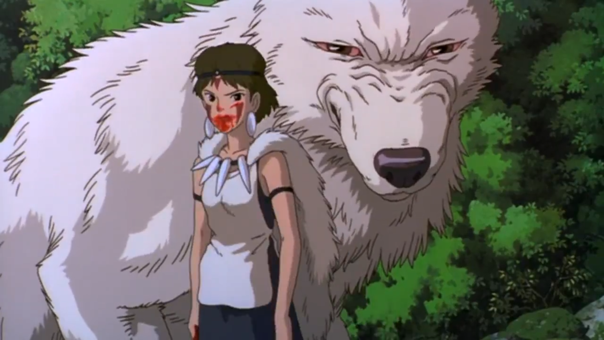 Scène culte de Princesse Mononoke
San, jeune femme japonaise aux cheveux foncés et aux yeux noirs, portant de grosses boucles d'oreilles blanches, un collier aves de gros objets blancs ressemblant à des griffes, une cape en fourrure blanche, un genre de haut blanc au dessu d'une tunique bleu foncé, un genre de fin bandeau noir autour de la tête et deux bandeaux noirs aux biceps, des peintures pourpres au niveau des joues et du front, et la bouche couverte de sang, se tient debout et fixe avec un air de défi.
Derrière elle se tient une immense louve blanche, la déesse Moro, plus grande qu'elle, les traits tirés, la rendant menaçante.
Derrière, on distingue des arbres d'un feuillage verdoyant, indiquant qu'on se situe dans une forêt.
